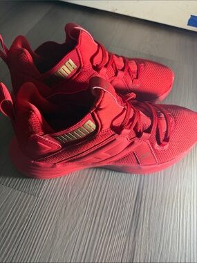Puma womens Red Athletic Sneakers with Gold Accent